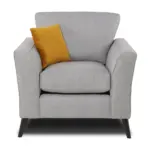The Mahir Lenka Fabric 3+1+1 Seater Sofa Sets features a modern armchair with light gray upholstery, flared arms, a mustard yellow throw pillow, and dark tapered legs. Its cushioned seat offers contemporary comfort and effortlessly elevates any rooms aesthetic.