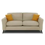 The Mahir Lenka Fabric 3+1+1 Seater Sofa Set features a beige design with dark legs and includes two orange throw pillows, one at each end. Its modern minimalist style boasts smooth cushions and slightly angled armrests, ideal for enhancing any living space with a stylish touch.
