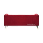 Discover the Sana Velvet 2 Seater Tuxedo Sofa in red, featuring a clean design with gold-tipped metal legs and plush upholstery for a modern, elegant look. The FashAble.in logo is subtly placed on its back.